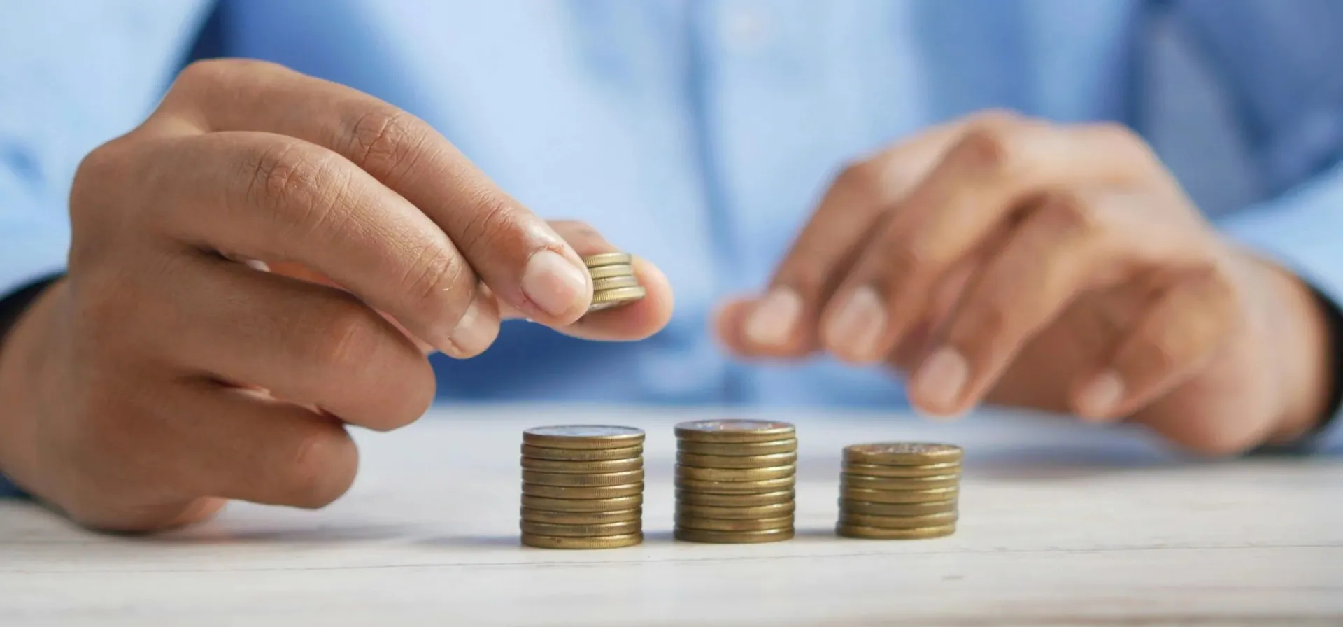 money-saving-businessman-real-estate-contractor-with-coins